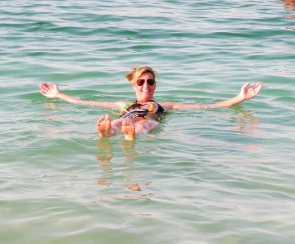 Floating in the salty Dead Sea.