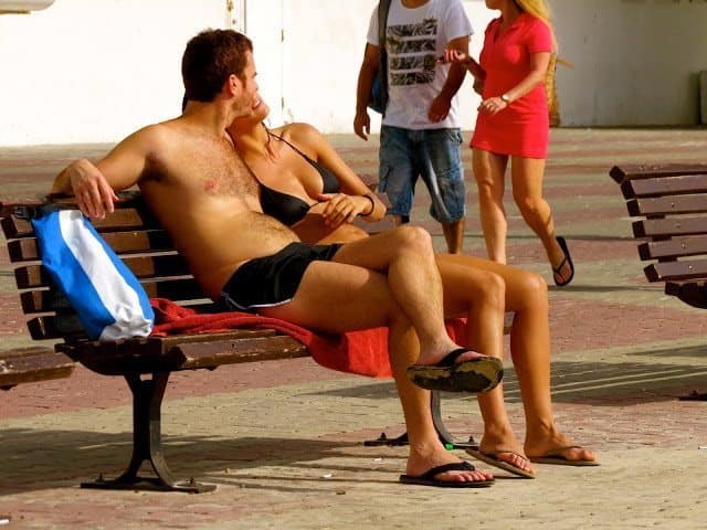 Locals relax by the beautiful water. 