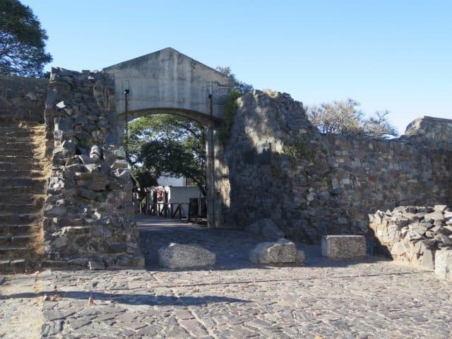 The old city gate marking the entrance to the historic district.