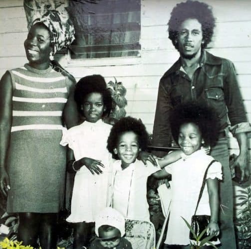 Rita and Bob Marley and their young family. Photo courtesy Bob Marley Museum.