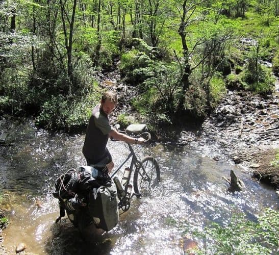 Through a stream.