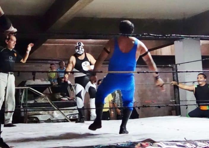In San Salvador, Luchadores face off in an underground arena.