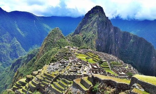 Macchu Picchu, Peru. Climbing mountains and getting the endorphin rush from being there can help you feel more familiar and comfortable while traveling. 