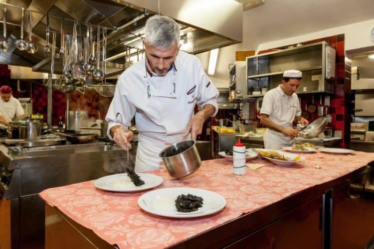 Chef/owner Marco Toffolin and Luca Sccarpel in the kitchen at Locanda da Lino