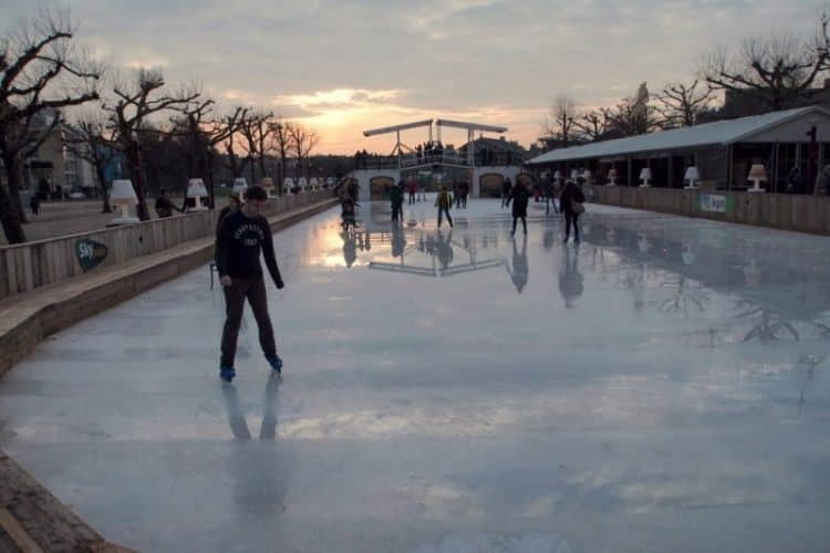 Ice skating on a temporary rink in downtown Amsterdam, Netherlands. Max Hartshorne photos.