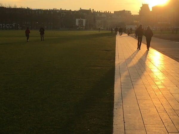 Strolling the Museumplein near the temporary ice rink in Amsterdam.