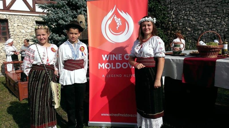 A Asconi local students in national dress for National Wine Day. 