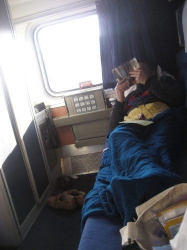 Napping in the train cabin.