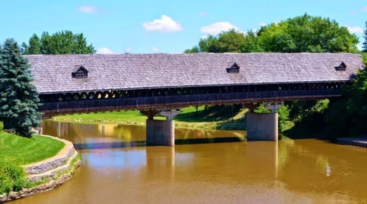A View of Holzbrucke Wooden Covered Bridge from the River Place Shops