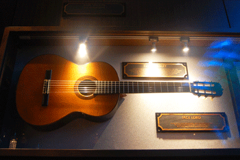 Jack Lord's guitar at the Hard Rock Cafe in Honolulu. Elvis the King used to play it, too. 