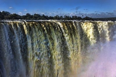 Zambia swimming: Victoria Falls, in the dry season. Devils Pool is on the edge of the falls - extreme right.