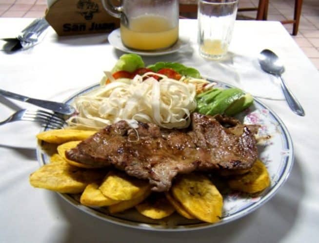  Does jungle rodent (majás) call for red wine or white wine? At Ruiz Hotel’s open-air dining room in Pucallpa, the author chose a pitcher of sweet carambola (starfruit) juice instead.