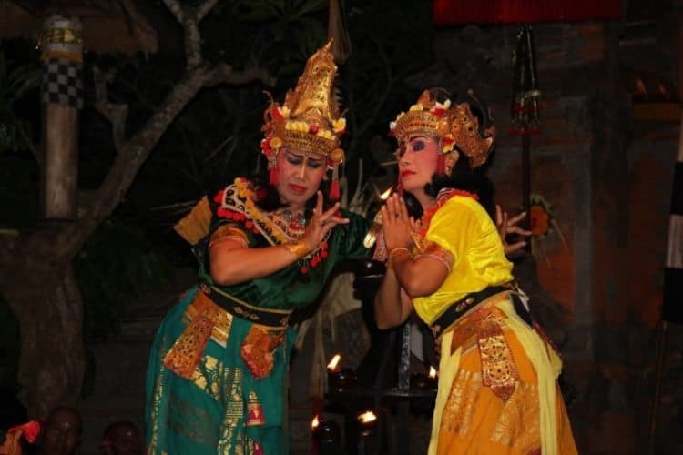 Balinese women dancing in the village of Batu Bulan, Bali. 
