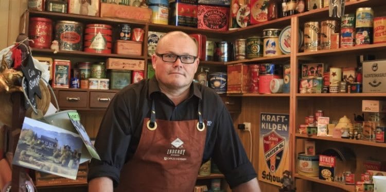 Svein Berfjord of Berg Gard Farm, Norway, in his farm shop/deli.