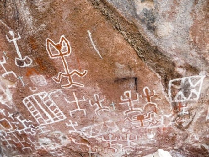 The Incamachay cave paintings. The shaman figure is on the right-hand side.