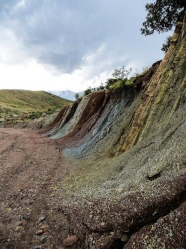 Rainbow colored rocks on the track towards Potolo. Jul 16