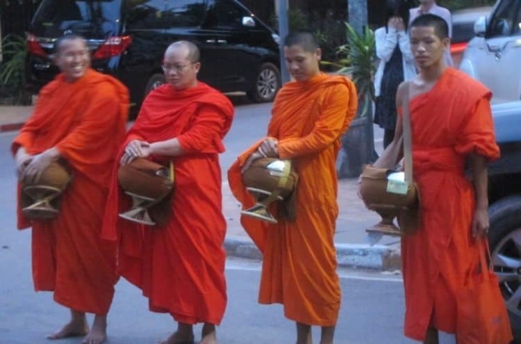 Tak-Bat: Monks reciting dharma in Vientenne, Laos. James Dorsey photos.