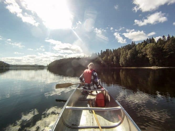 Canoeing in Dalsland, through lakes clean enough to drink from.