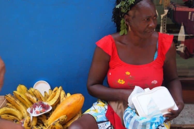 Vendors like this fruit seller are part of the fabric of Cartagena, Colombia.