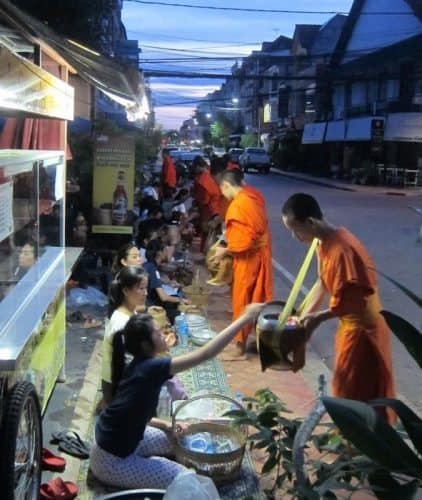 On many streets, early in the morning, you'll see these monks.