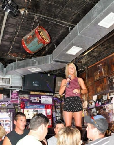 Singing on the bar comes naturally in Nashville, home to country music of all kinds.