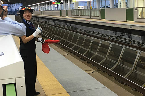 The Shinkansen conductor in Kyoto, Japan.