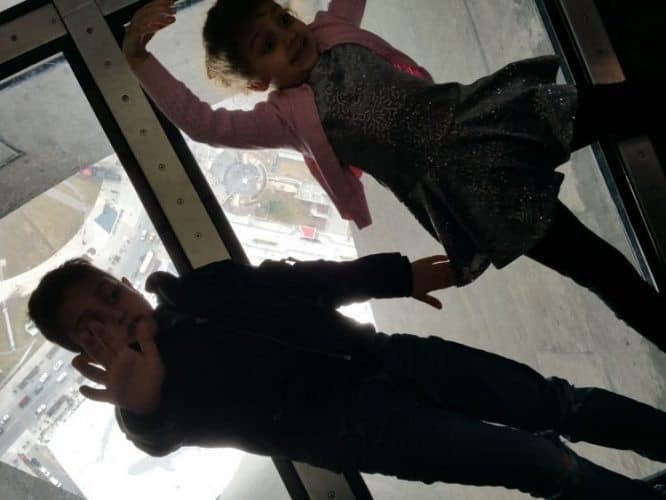 Kids playing at the CN Tower in Toronto, Canada.