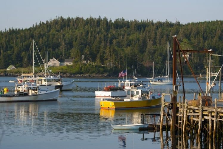 The coast of Downeast Maine is full of busy lobster and fishing boats. Cutler Harbor is the northernmost harbor in Maine.