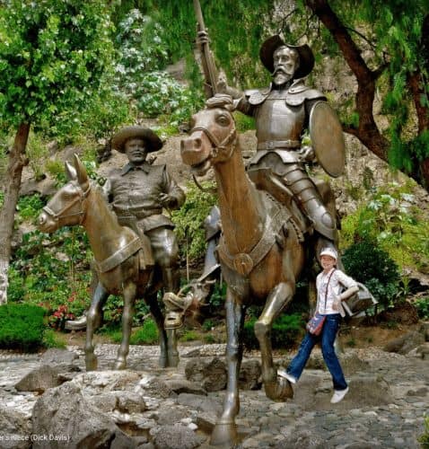 Statue of Don Quixote and Sancho Panza in the Plaza Allende with the photographer's niece. Dick Davis photo.