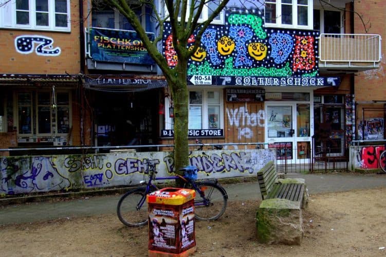 A vibrant hot spot for vinyl record shopping in the Karoviertel area is frequented by music lovers in the evening as the city comes alive.
