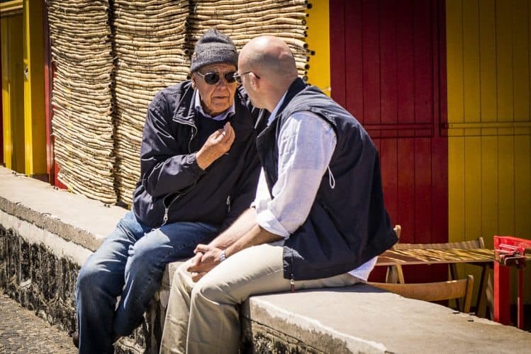 It's a simple, laid-back life in Procida where locals still sit on stoops and chat all day.