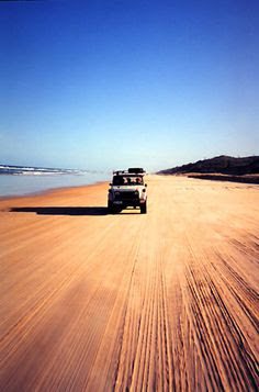 Taking a Jeep on the vast and empty beaches of Fraser island.