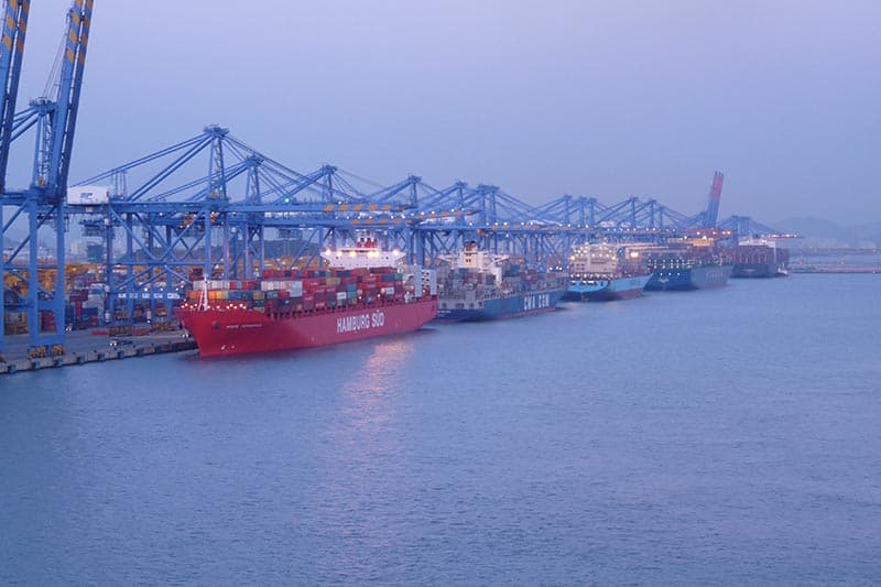 The ship docked in Busan at 11 am and departed at 6 pm, just long enough to load and unload containers freighter travel