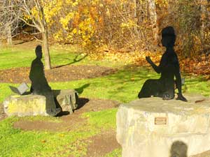 Silhouettes of Robert Frost and Emily Dickinson on Main Street in Amherst - photos by Stephen Hartshorne