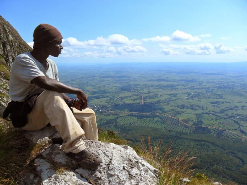 John takes in the view on top of the Island in the Sky. We could see surrounding areas that John had never been to even though he had spent all his life in Mulanje.