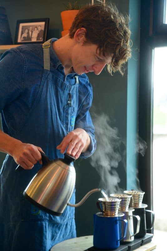 Chef George is not only the owner but part barista preparing the best specialty coffee in town.