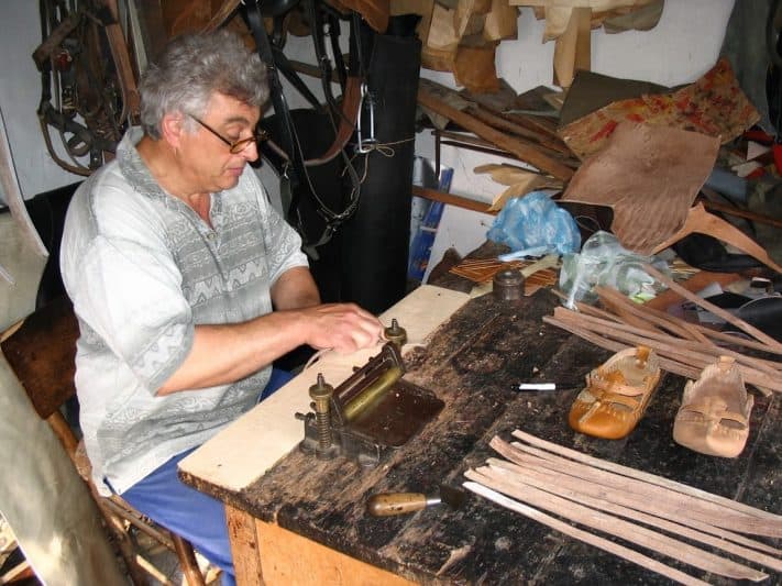 The ancient crafts are still being practiced in the mountain - leather-worker.