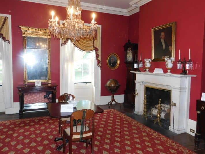 An elegant fireplace room inside the Ten Broeck Mansion. Many items and furniture within the mansion are originals.