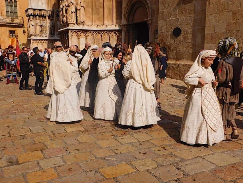 A traditional dance involving the Seven Cardinal Virtues takes places infront of the cathedral.