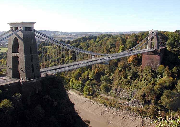 The Clifton Suspension Bridge is a symbol of Bristol, England, high above the Avon River.