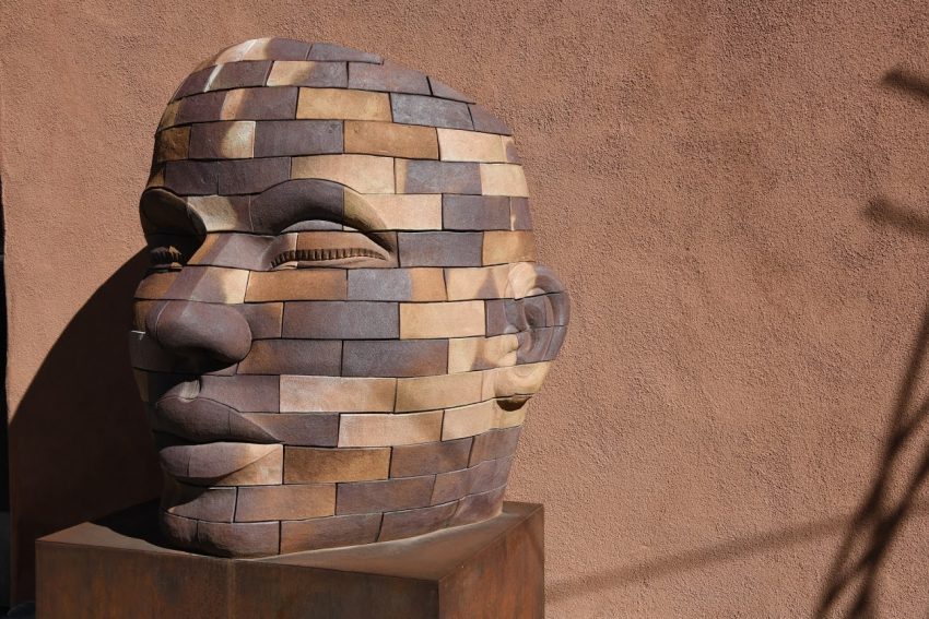Large human face sculpture on Canyon Rd, Santa Fe.