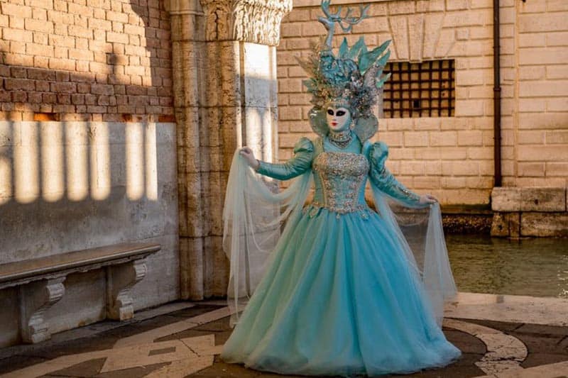 A costumed reveler in Venice.