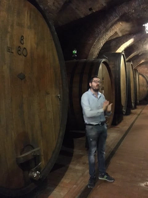 At a wine tasting in the town of Montepulciano,, we tour a cellar housed in caves carved by the Etruscans. Photo by Peter Petre.