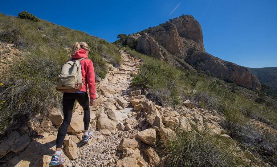 hiking up a mountain