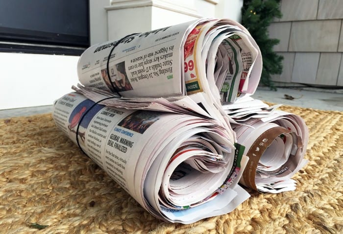 Remember to stop both paid and free newspapers from being delivered when you're away on a trip.