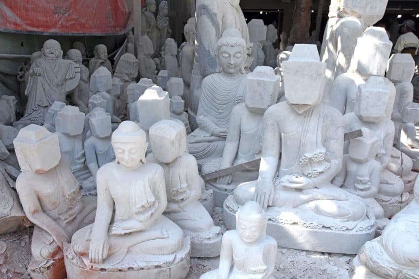 Stone Buddha statues in all manner of progress in Mandalay. 
