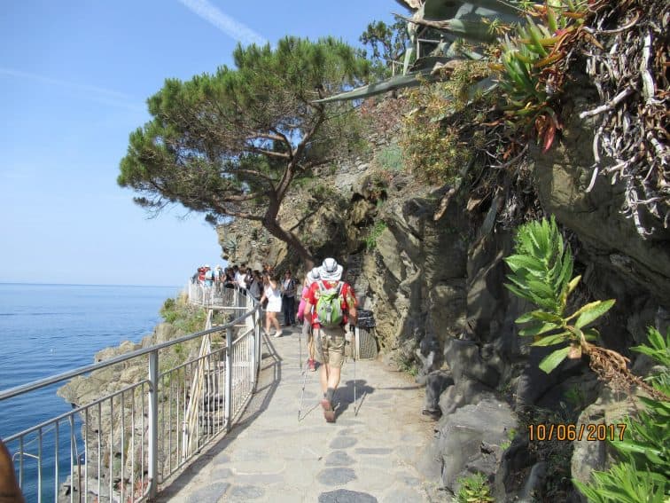 The small villages are connected by a series of pathways along the rocky shore of Tuscany.