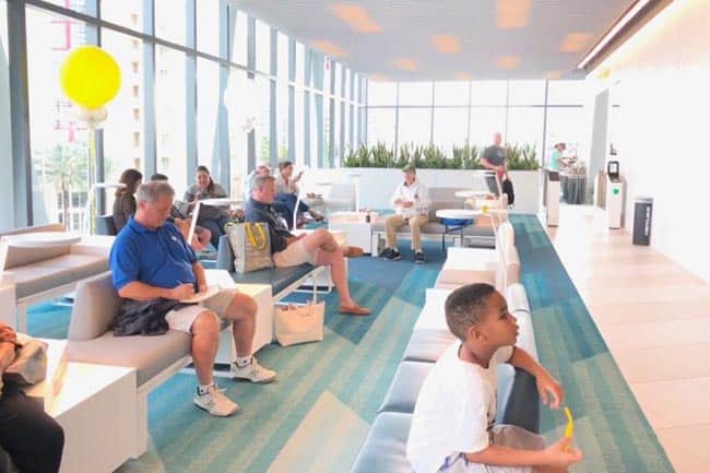 The spacious and airy Brightline lobby in Palm Beach, resembles a doctor's office more than a train station.