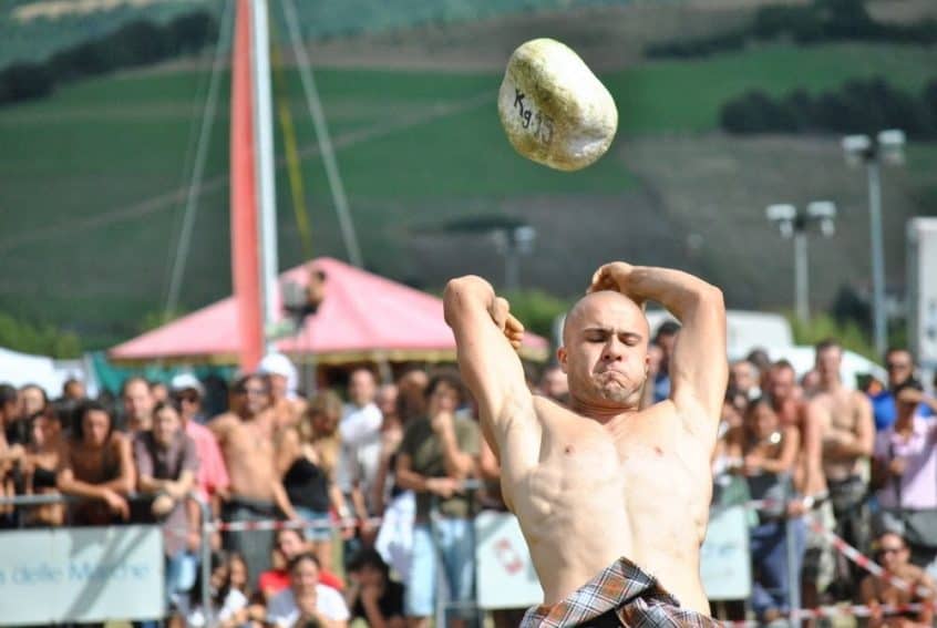 Celtic Games - tossing the stone at the Celtic Festival in Montelago, Italy
