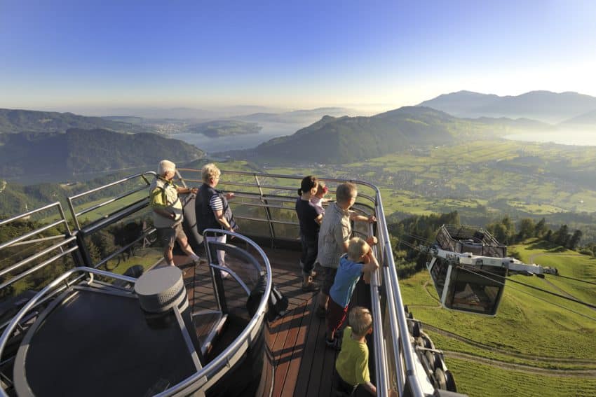 Travel up the mountainside atop a cable car. Photo from Swiss Travel System.